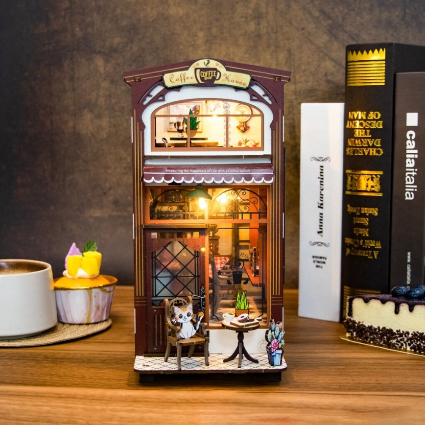 2Kids Toys - 3D skladačka LED Zarážka na knihy Kaviareň 2xAAA