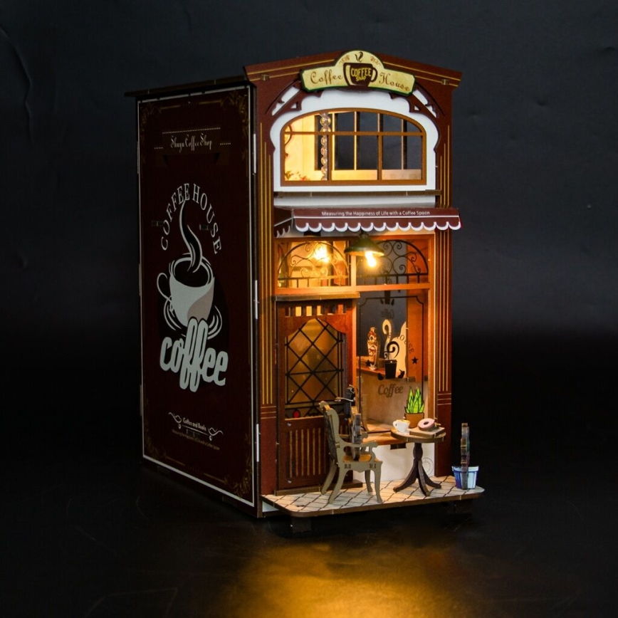 2Kids Toys - 3D skladačka LED Zarážka na knihy Kaviareň 2xAAA