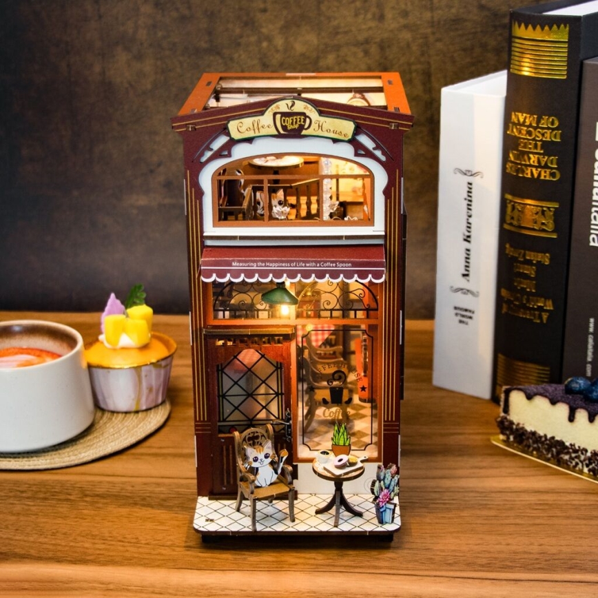 2Kids Toys - 3D skladačka LED Zarážka na knihy Kaviareň 2xAAA