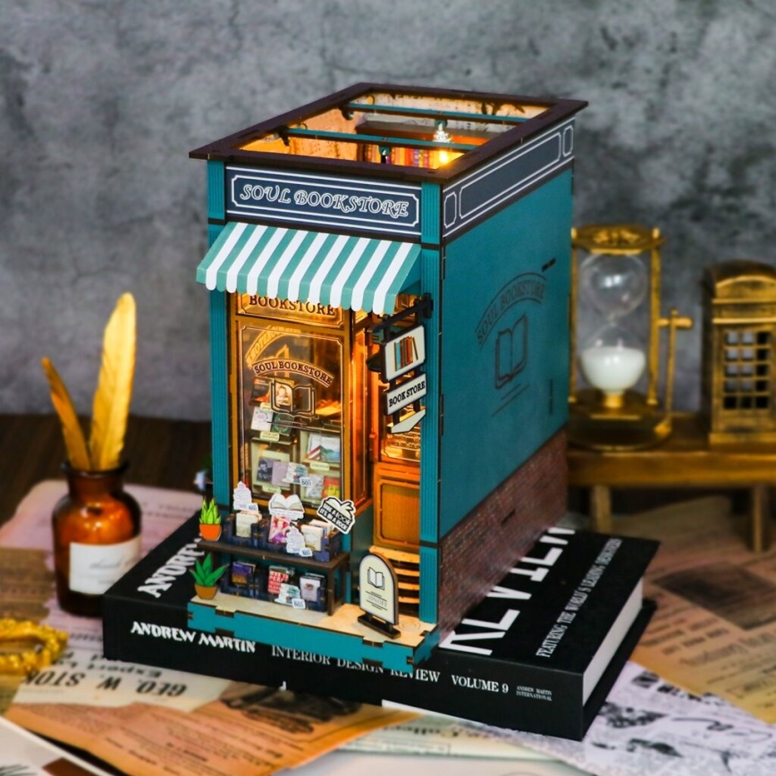 2Kids Toys - 3D skladačka LED Zarážka na knihy Kníhkupectvo duša 2xAAA