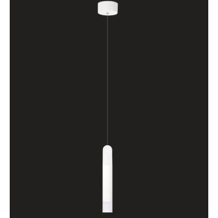 Dlhá biela valcová lampa visí z čierneho stropu na tenkom kábli. Horný koniec kábla je pripevnený k bielemu stropnému krytu.