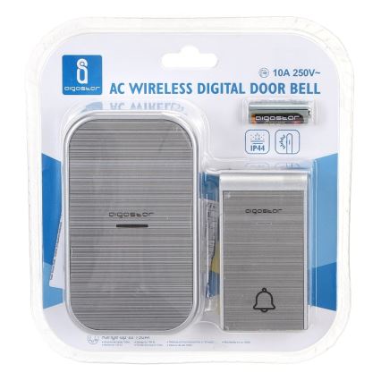 Bezdrôtový digitálny zvonček Aigostar s vnútornou a vonkajšou jednotkou je zabalený v priehľadnom obale. Vonkajšia jednotka vysiela signál, ktorý vnútorná jednotka prijíma a oznamuje zvukovým signálom. Súčasťou balenia je aj batéria.