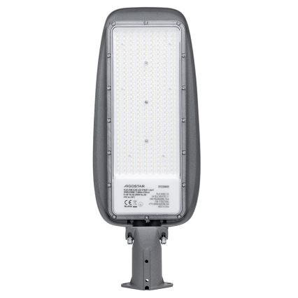 LED pouličná lampa svieti. Je sivá, pripevnená k stĺpu. Na lampe je štítok s údajmi: AIGOSTAR 191339605, 80/100/120/150W, 6500K, IP65, -20°C do +50°C.