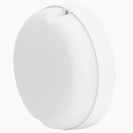 Biela nástenná lampa je umiestnená na bielom pozadí. Lampa je okrúhla a plochá.