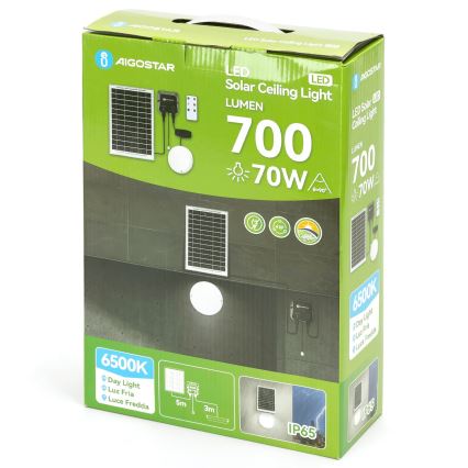 Balenie solárneho LED stropného svetla s výkonom 70W a 700 lumenov. Sada obsahuje solárny panel, svetlo a ovládač. Balenie zobrazuje inštaláciu na stene.