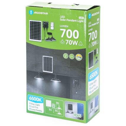 Balenie solárneho závesného LED svetla s dvoma svietidlami. Solárny panel nabíja batériu, ktorá napája svetlá. Balenie uvádza svetelný tok 700 lúmenov, príkon 70W a farebnú teplotu 6500K (denné svetlo).