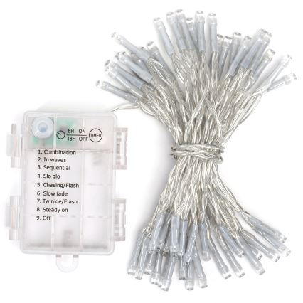 LED svetelný reťaz s batériovým boxom leží na bielom pozadí. Reťaz má 30 LED diód a ponúka deväť svetelných režimov (kombinácia, vlny, sekvenčné, pomalé svietenie, prenasledovanie/blesk, pomalé zhasínanie, blikanie/blesk, stále svietenie, vypnuté). Batériový box zobrazuje časovač 6 hodín zapnuté/18 hodín vypnuté.