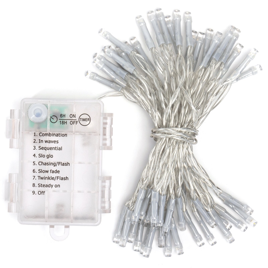 LED svetelný reťaz s batériovým boxom leží na bielom pozadí. Reťaz má 30 LED diód a ponúka deväť svetelných režimov (kombinácia, vlny, sekvenčné, pomalé svietenie, prenasledovanie/blesk, pomalé zhasínanie, blikanie/blesk, stále svietenie, vypnuté). Batériový box zobrazuje časovač 6 hodín zapnuté/18 hodín vypnuté.
