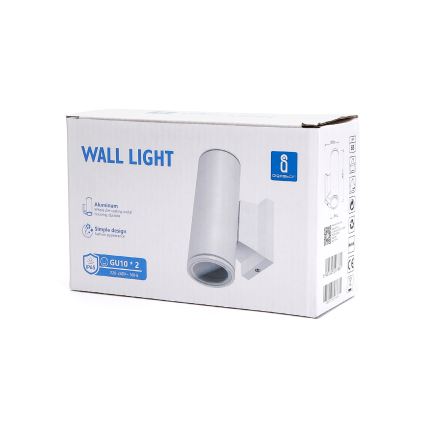 Biela nástenná lampa je zobrazená v balení. Lampa je valcového tvaru z hliníka, s jednoduchým dizajnom a uchytením na stenu. Balenie uvádza: WALL LIGHT, GU10 * 2, 220-240V ~ 50Hz, IP65.