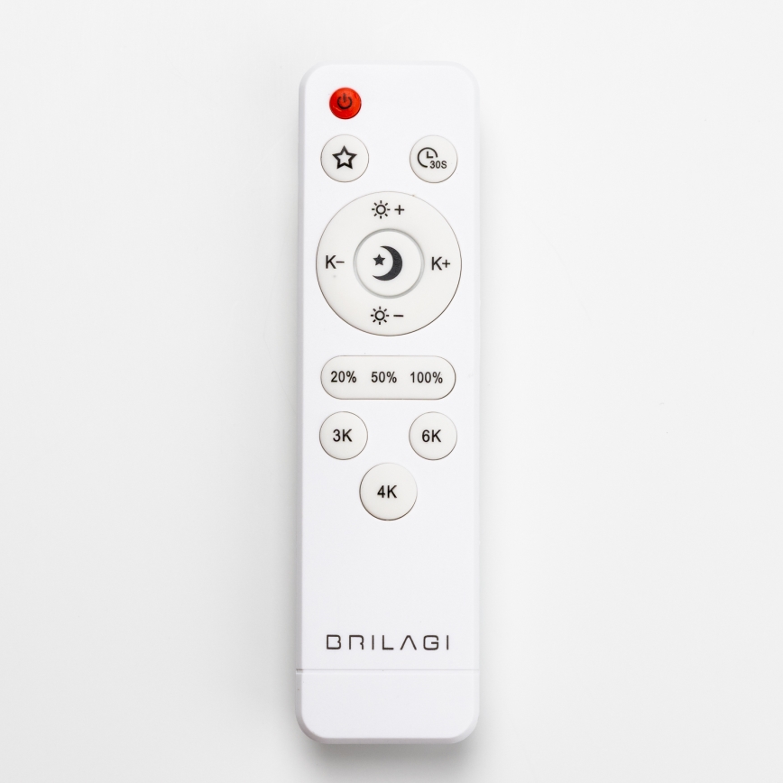 Biela diaľková ovládač s tlačidlami na nastavenie jasu a farebnej teploty svietidiel, značkou BRILAGI, leží na bielom podklade. Tlačidlá zobrazujú hodnoty 20%, 50%, 100%, 3K, 4K, 6K, symboly slnka a mesiaca a časovač 30s.