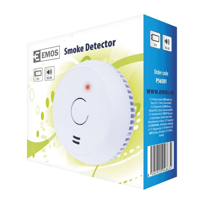 Detektor dymu Emos P56501, biely, je zobrazený na obale. Detektor je napájaný 9V batériou a má 85 dB sirénu. Obal obsahuje kód objednávky a webovú adresu www.emos.eu.
