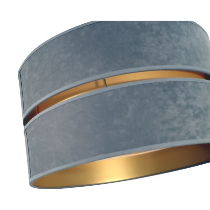 Dvojvrstvový tienidlo visí. Tienidlo je sivomodrej zamatovej farby s vnútorným zlatým okrajom. Je zobrazené na bielom pozadí.