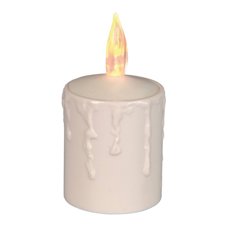 LED sviečka s napodobnením kvapkajúceho vosku, svieti, na bielom pozadí.