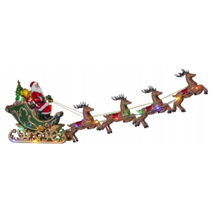 Santa Claus sedí v zelenom sane s darčekmi, ktoré ťahá štvorica sobov s farebnými svetlami. Sane a sobi sú umiestnené na bielom pozadí.