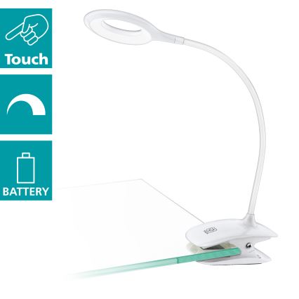Biela stolová lampa s dotykovým ovládaním a batériovým napájaním je pripevnená k sklenenej podložke pomocou svorky. Lampa má kruhový svetelný zdroj. Touch, BATTERY.