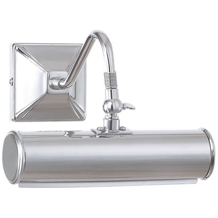 Nástené svietidlo s chrómovým valcovým telom osvetľuje. Svietidlo je pripevnené na štvorcovej nástennej konzole s výklopnou ramennou časťou.