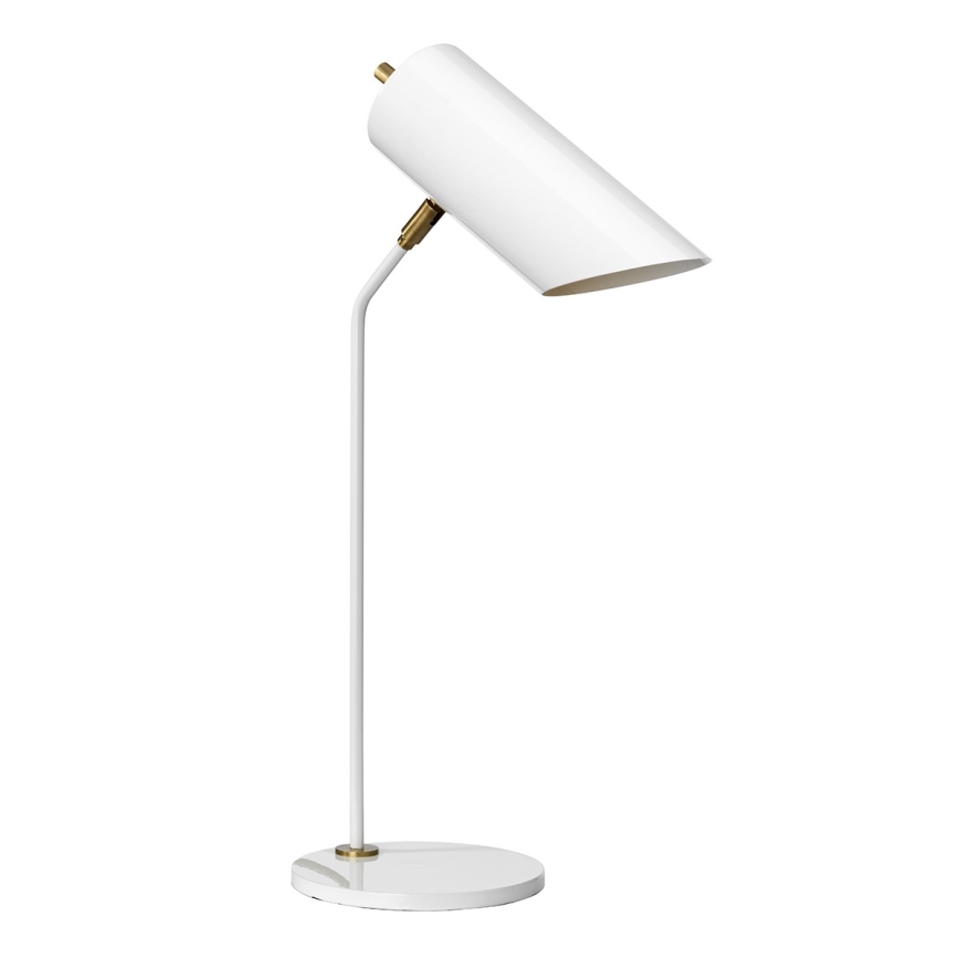 Biela stolová lampa s valcovitým tienidlom svieti. Je umiestnená na bielom kruhovom podstavci, s jednou nohou z rovnakého materiálu. Zlaté detaily sú viditeľné na spojoch.