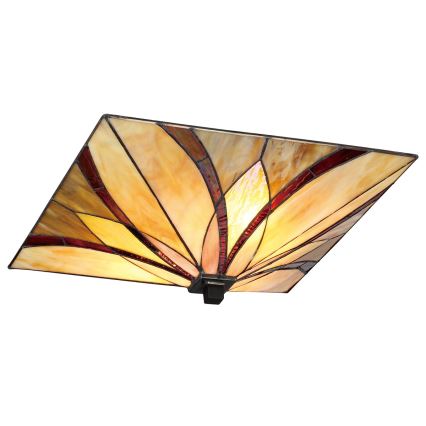 Štvorcový tienidlo svietidla svieti. Jeho povrch je tvorený farebným vitrážovým sklom v odtieňoch béžovej a červenohnedej, s motívom kvetu. Tienidlo je pripevnené k stropu.