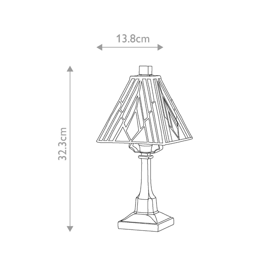 Stolová lampa s štvorcovou základňou a štíhlym stĺpikom nesie trojuholníkový tienidlo s geometrickým vzorom. Výška je 32,3 cm, šírka tienidla 13,8 cm.