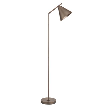 Stojacia lampa s kužeľovitým tienidlom stojí na kruhovom podstavci. Lampa je kovová, tmavo bronzovej farby. Tienidlo je nasmerované mierne do strany.