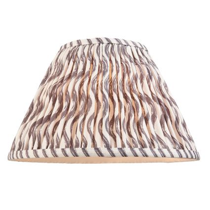 Tienidlo na lampu, z vrchnej strany zvrásnené, s vlnkovým vzorom v sivej a krémovej farbe, je zobrazené na bielom pozadí.
