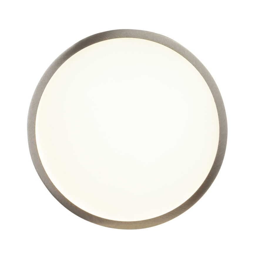 Okrúhle svietidlo svieti. Má svetlý stred a tmavosivý kovový rám. Je umiestnené na bielom pozadí.