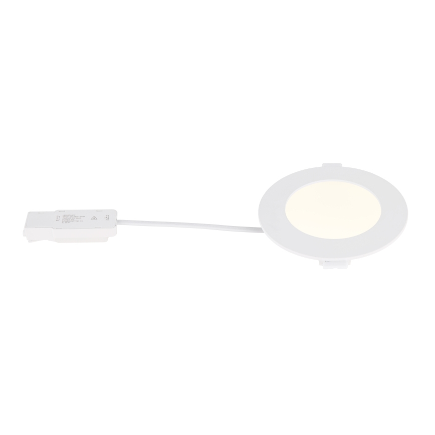 LED svietidlo svieti. Pripojené je k malému, bielemu napájaciemu adaptéru tenkým káblom. Svietidlo je okrúhle a biele.