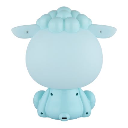 Svetlomodrá nočná lampa v tvare ovce sedí na bielom pozadí. Viditeľný je USB port na nabíjanie.