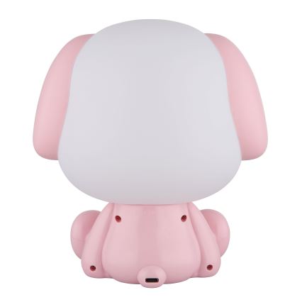 Ružová stolná lampa v tvare sediaceho šteňaťa s bielym osvetľovacím prvkom na chrbte. Lampa je zobrazená zo zadnej strany, vidieť USB nabíjací port.