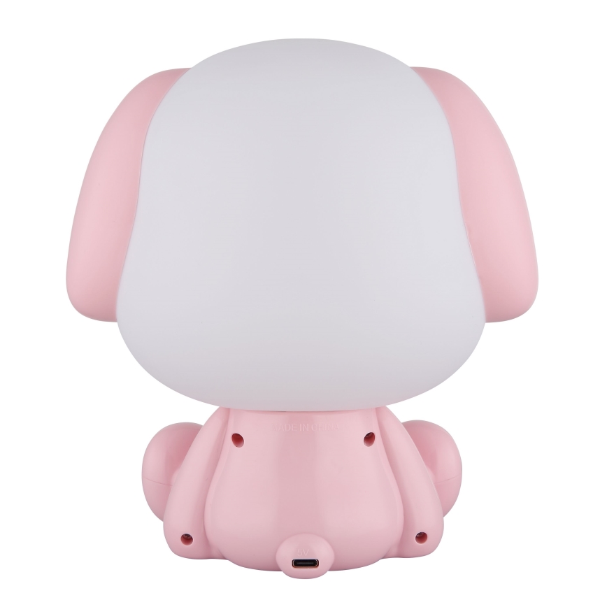 Ružová stolná lampa v tvare sediaceho šteňaťa s bielym osvetľovacím prvkom na chrbte. Lampa je zobrazená zo zadnej strany, vidieť USB nabíjací port.