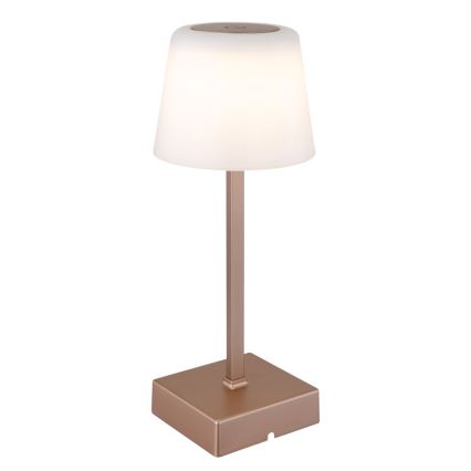 Stolová lampa s medeným podstavcom a stonkou, svietiace matné biele tienidlo. Lampa stojí na štvorcovom podstavci.