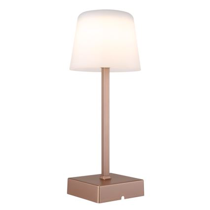 Stolová lampa svieti. Má medenú podstavu a stĺpik, na ktorom je umiestnený biely tienidlo. Lampa je na bielom pozadí.
