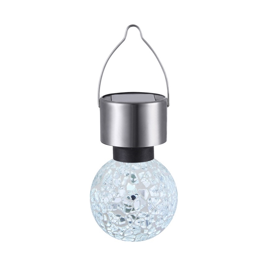 Solárna lampa visí na kovovom háčiku. Guľová sklenená časť je zdobená mozaikou. Vrchná časť obsahuje solárny panel a kovový kryt.