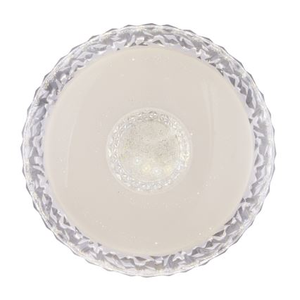 Svetlo s okrúhlym tienidlom, ktoré je vyrobené z priesvitného materiálu s fasetovaným okrajom, má v strede menší, jemne mliečne zafarbený, kryštálikmi posiaty disk. Celé tienidlo je svetlohnedo-biele.