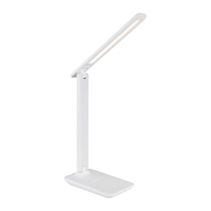 Biela stolná lampa s LED osvetlením je umiestnená na bielom pozadí. Lampa je zložená, jej rameno je ohnuté smerom hore a dopredu. Má štíhlu konštrukciu a plochú podstavu.