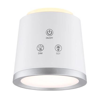 Biela valcová lampa s priemerom svetla. Na povrchu sú tlačidlá: ON/OFF, DIM, CCT. Lampa je na bielom pozadí.