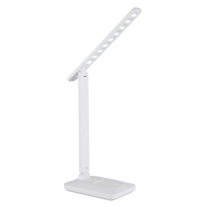 Biela stolná lampa s LED osvetlením je umiestnená na bielom pozadí. Lampa je zložená, jej ramená sú sklopené a LED diódy sú umiestnené v hornej časti.