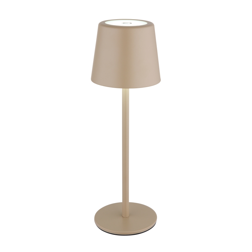 Stolová lampa s valcovitým tienidlom a vysokým, úzkym stojanom svieti. Lampa je svetlohnedá, stojí na kruhovom podstavci. Prostredie je biele, čisté pozadie.