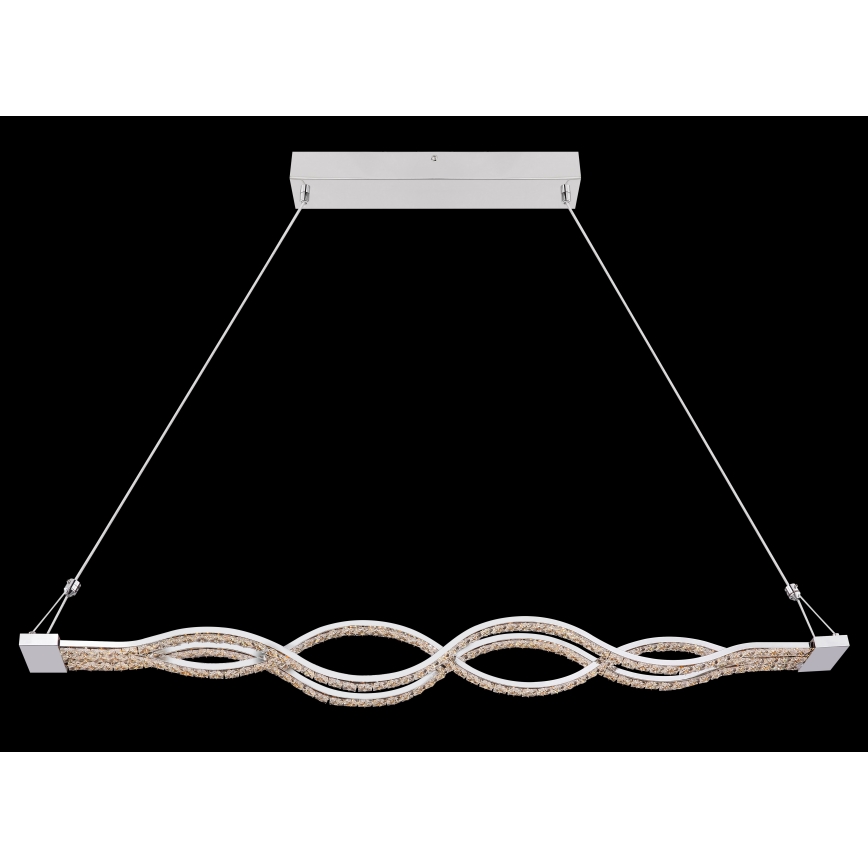 Svietidlo visí zo stropu na dvoch kábloch. Jeho telo tvorí dvojitá vlnovka osadená kryštálikmi. Svietidlo je upevnené na štvorcovej kovovej konzole.