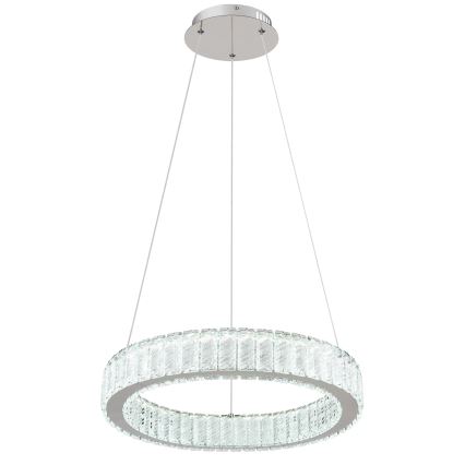 Kruhový LED luster visí zo stropu. Luster je tvorený kovovou konštrukciou s množstvom priehľadných kryštálov. Svetlo sa šíri z vnútornej strany kruhu.