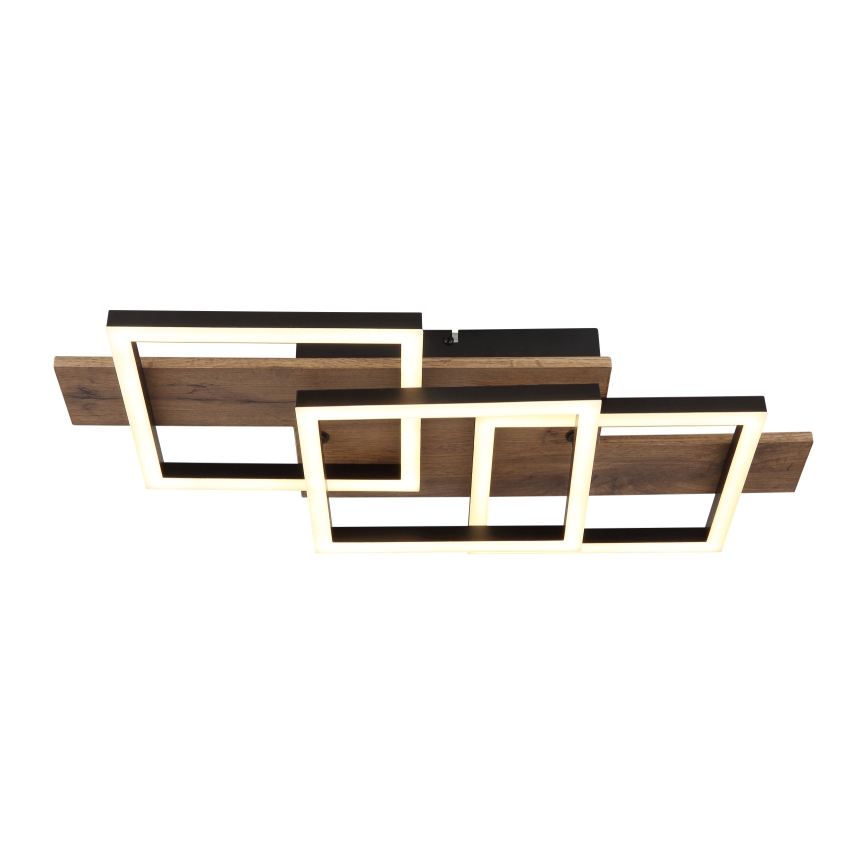 Svietidlo svieti. Skladá sa z prekrývajúcich sa štvorcových LED rámov z tmavého kovu a drevených lamiel. Je pripevnené k stropu.