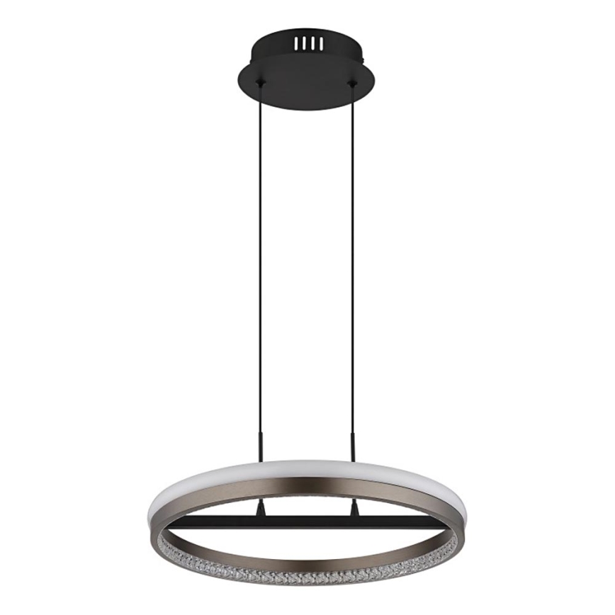 Svietidlo visí zo stropu. Je kruhového tvaru s vnútorným bielym a vonkajším hnedým okrajom, ozdobené kryštálmi. Zavesené je na troch čiernych kábloch z čierneho stropného držiaku.