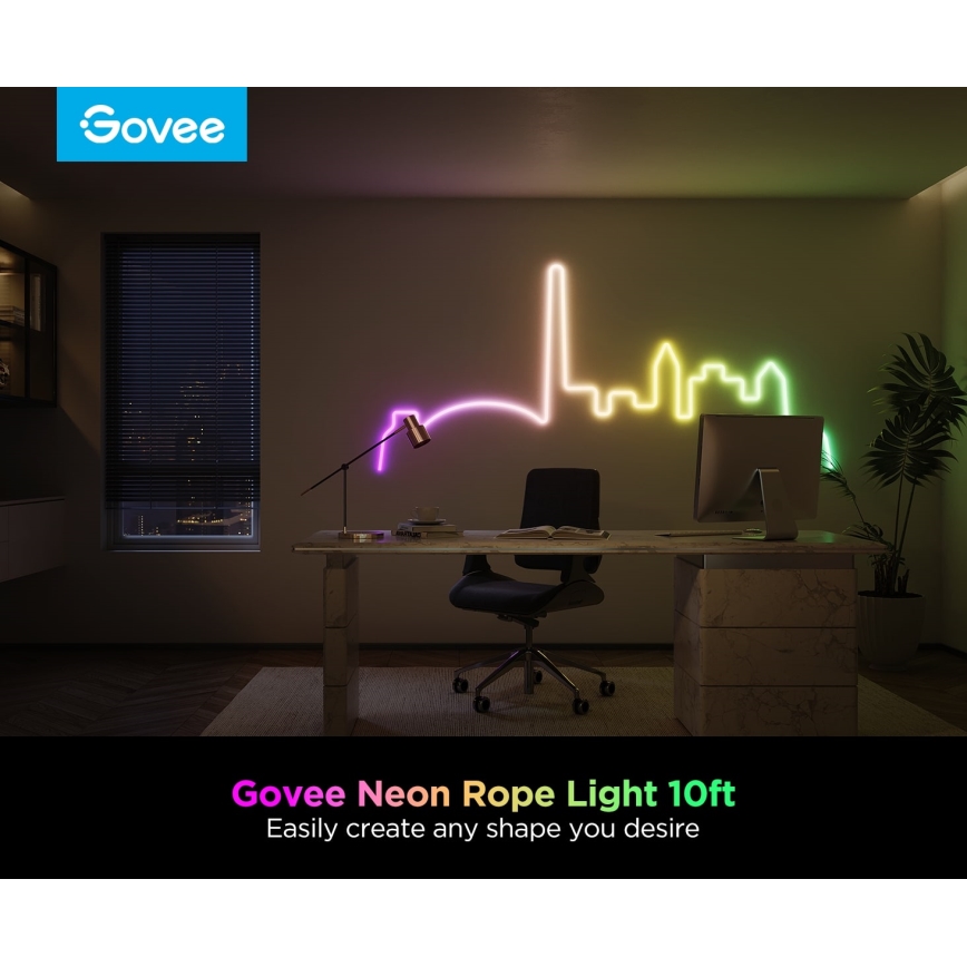 Neonové LED svetlo vo forme mestskej panorámy je umiestnené na stene kancelárie. Svetlo vytvára farebný efekt. Text: Govee Neon Rope Light 10ft. Easily create any shape you desire.