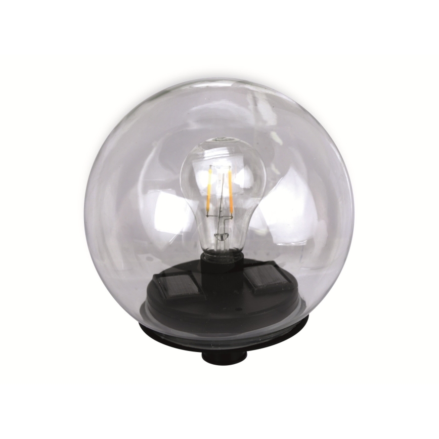 Solárna lampa s LED žiarovkou je umiestnená vo vnútri sklenenej gule na čiernom podstavci.
