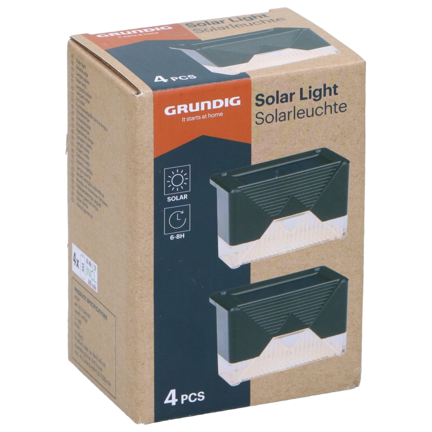 Škatuľa s štyrmi solárnymi svetlami Grundig. Svetlá sú tmavozelené s priehľadným spodkom. Na škatuľke je uvedené: „Solar Light Solarleuchte“, „4 PCS“, „GRUNDIG“, „It starts at home“, „SOLAR“ a „6-8H“.
