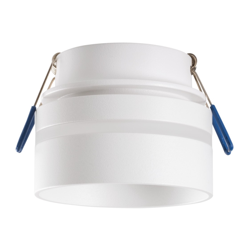 Biela nástenná lampa s dvoma pruhmi z priesvitného materiálu je pripevnená dvomi pružinovými svorkami s modrými koncovkami. Lampa je valcovitého tvaru.