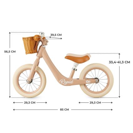 Detské odrážadlové kolo béžovej farby s košíkom a hnedým sedadlom je zobrazené s rozmermi: celková dĺžka 85 cm, výška riadidiel 56,5 cm, výška sedadla 33,4-41,3 cm, priemer kolies 29,3 cm, šírka riadidiel 39,5 cm.