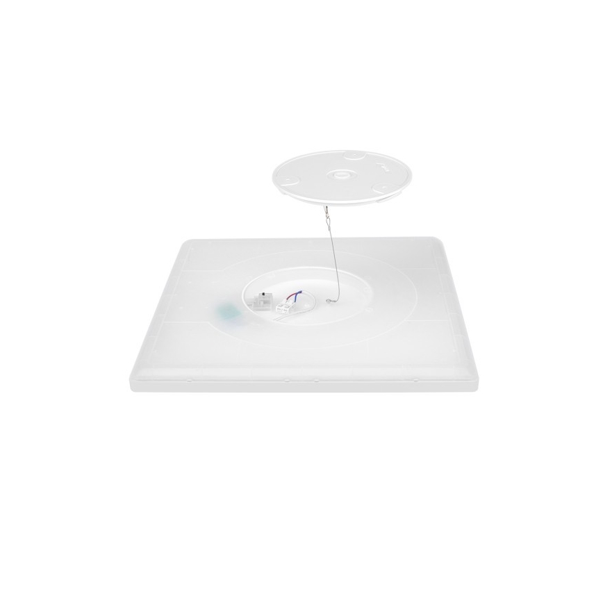 Štvorcový nástenný svietidlo je rozobraté. Jeho horná časť je oddelená od spodnej pomocou tenkého drôtu. Spodná časť obsahuje elektrické komponenty.