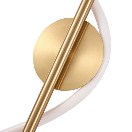 Zlatá kovová tyč prechádza cez zlatý disk. Disk je pripevnený k bielemu zakrivenému prvku. Celok pôsobí ako detail moderného osvetlenia.