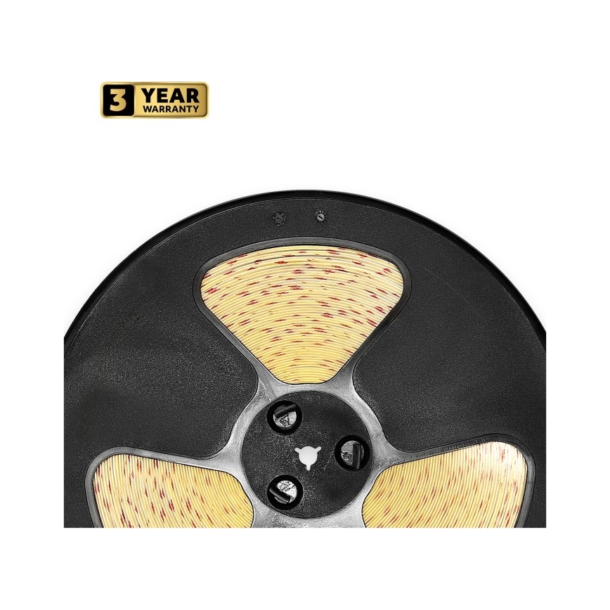 Cievka s LED pásom svetložltej farby s červenými bodkami je navinutá na čiernej cievke s trojramennou konštrukciou. Na obrázku je aj nálepka s textom 3 YEAR WARRANTY.